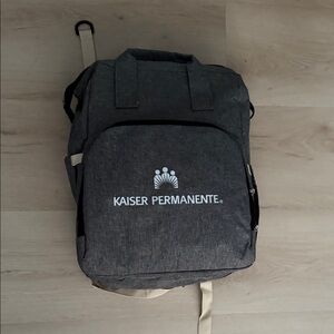 Gray Backpack diaper bag with changing pad